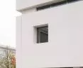 MSN's white concrete planes defy the ponderous context of downtown Warsaw
