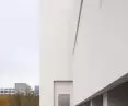 MSN's white concrete planes defy the ponderous context of downtown Warsaw