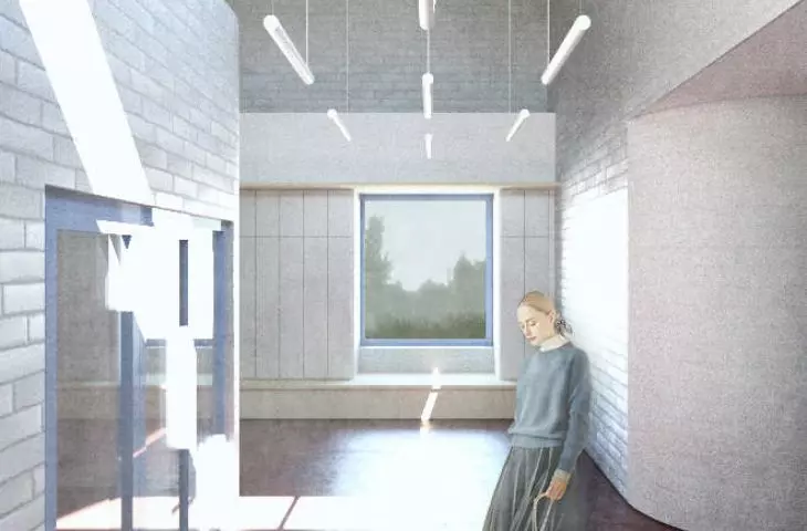 jasną, minimalistyczną bryłę architekci przełamali niebieską stolarką