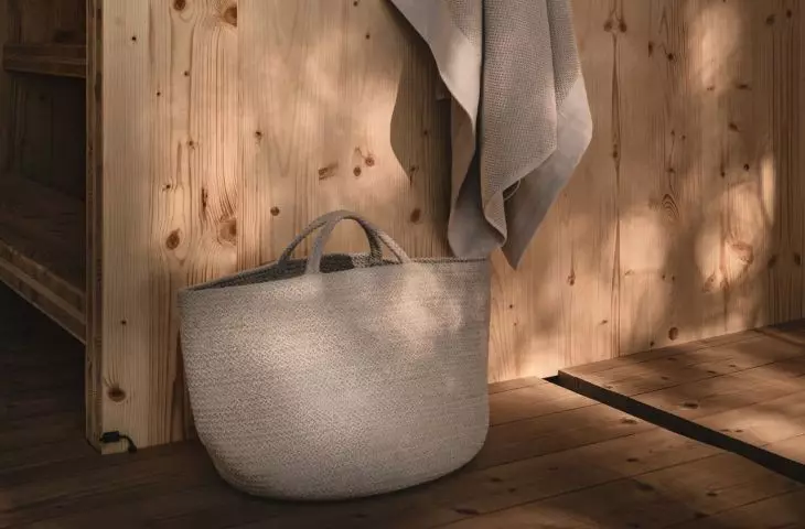 Tyyni 10 model includes a dressing room and a sauna chamber with a stove