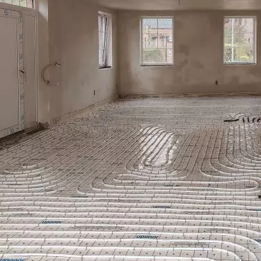 View of the floor with heating pipes