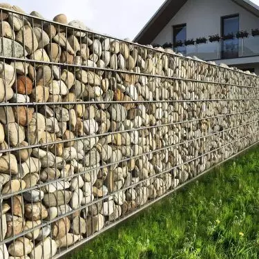 Gabions consist of metal mesh or baskets made of galvanized or coated steel, filled with natural materials such as stones, pebbles, bricks or wood