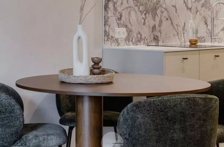 The dining area is located right next to the kitchenette