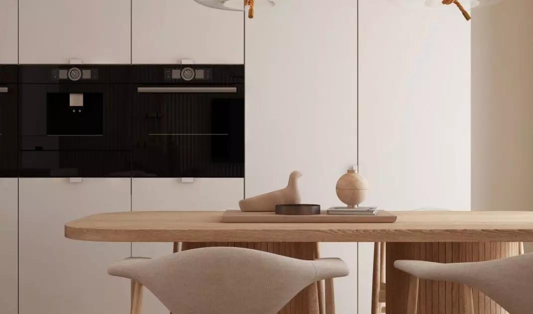 W kuchniach boho królują naturalne materiały, takie jak drewno, rattan, len czy ceramika, zestawione z ciepłymi tonami