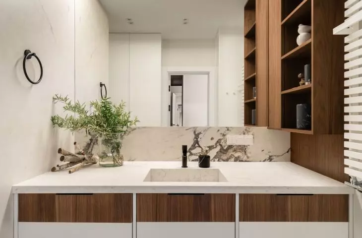The development combines marble and wood