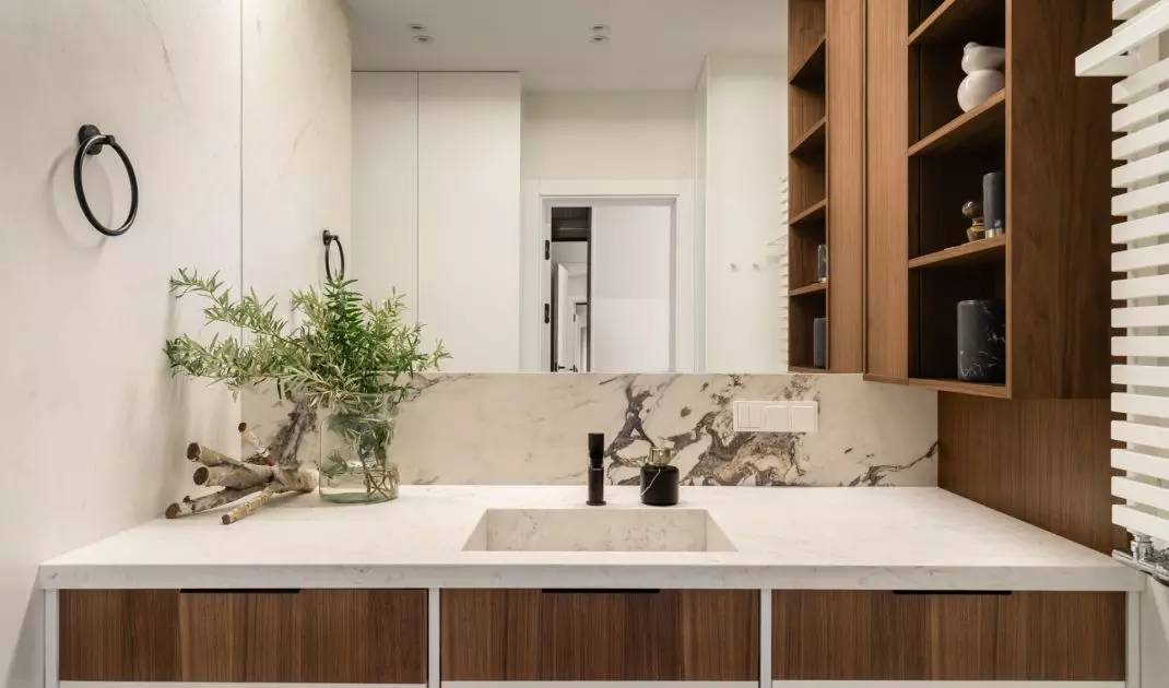 The development combines marble and wood