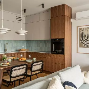 Modern vintage style apartment in Wroclaw. The apartment includes a living room with a kitchenette, three bedrooms, a bathroom, a separate toilet and a spacious hall.