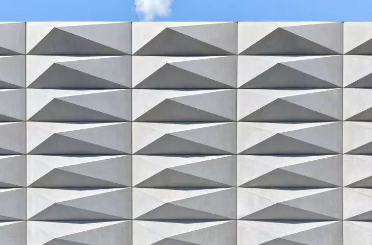Teatro Borsoni, Brescia - the facade of the theater is distinguished by a geometric pattern composed of triangular elements resembling pyramids