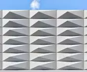 Teatro Borsoni, Brescia - the facade of the theater is distinguished by a geometric pattern composed of triangular elements resembling pyramids