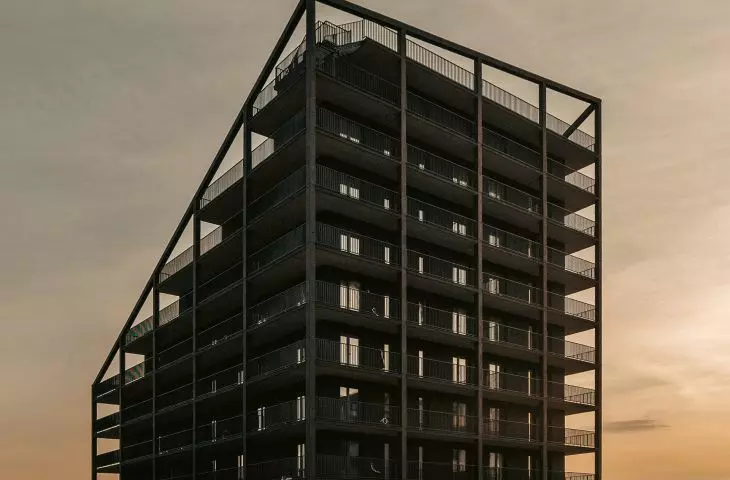 the elements surrounding the walls of the building add lightness to the whole mass; the most important role is played here by oblique lines, which emphasize the irregular shape of the upper part of the building and complete the facade