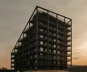 the elements surrounding the walls of the building add lightness to the whole mass; the most important role is played here by oblique lines, which emphasize the irregular shape of the upper part of the building and complete the facade