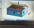 photo of the work at the laptop retraining with revit.