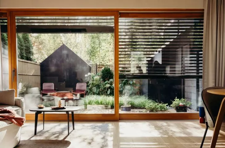 Wooden elements connect interior and exterior