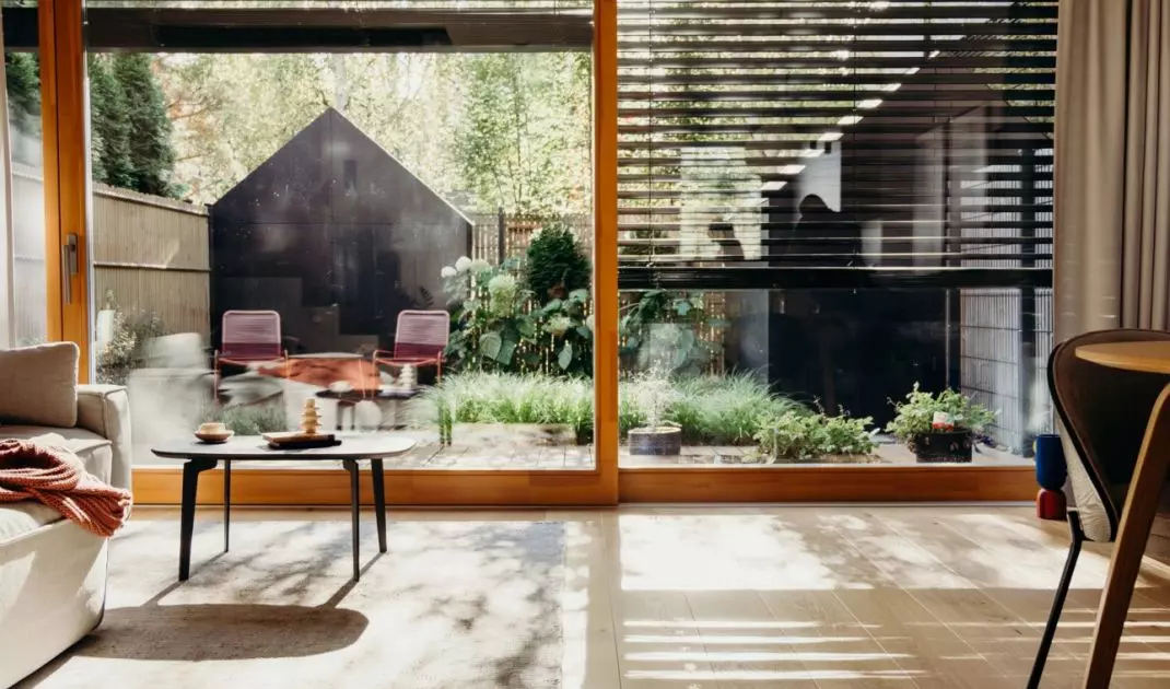 Wooden elements connect interior and exterior