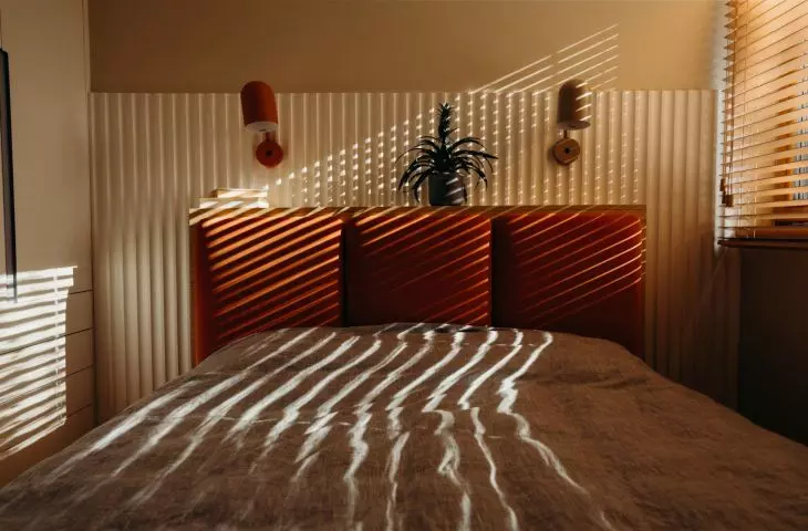 Natural light beautifully illuminates the interior of the bedroom