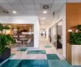 floors feature marmoleum and yarn carpeting, consisting of 90 percent recycled material