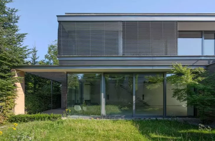 Large glazing opens the interiors to the garden and provides access to sunlight