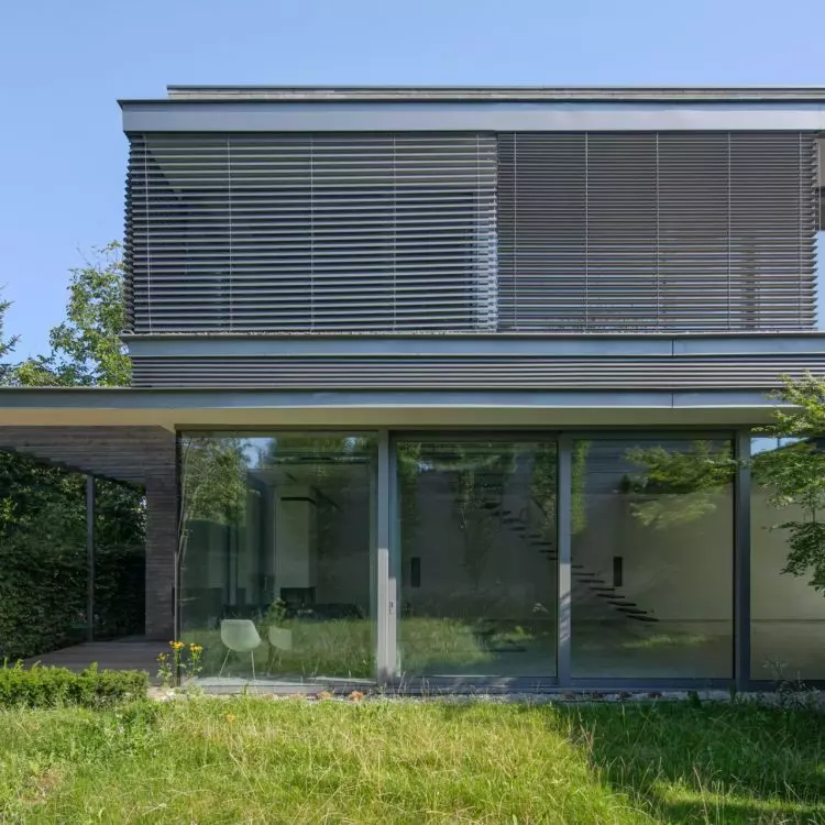 Large glazing opens the interiors to the garden and provides access to sunlight