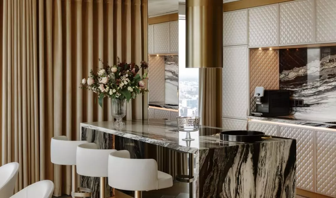 Interior of the apartment at Zlota 44 street in Warsaw - view of the kitchen island in the kitchen 