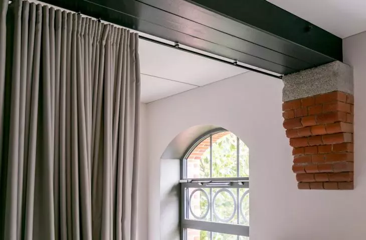 The historic elements have been complemented with modern materials that continue the character of the building