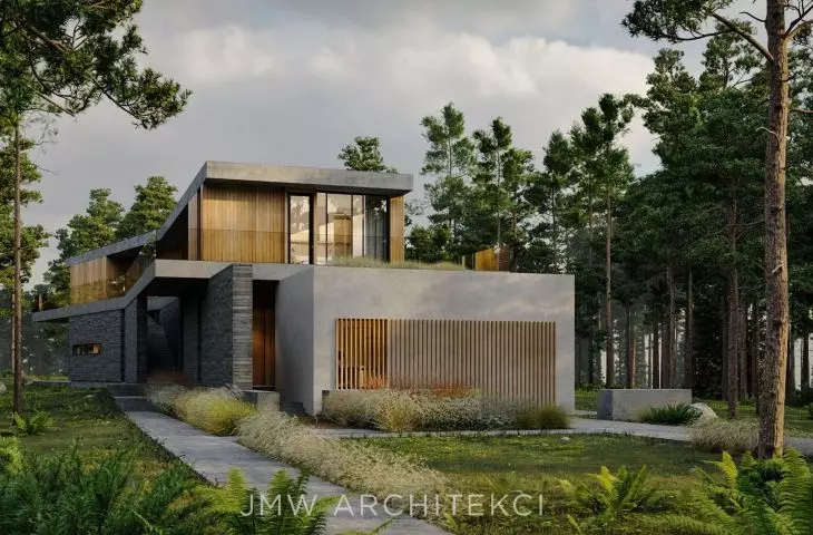 The stone block isolates the house from neighboring buildings, creating an intimate space