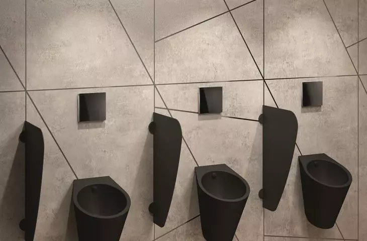 Black FINO urinal, black AZA baffle and black TEMPOMATIC 4 urinal flushing system from DELABIE