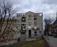 budynek mieszkalny autorstwa Wojciecha Obtułowicza u zbiegu ulic Legionów Piłsudskiego i Jana Zamoyskiego 