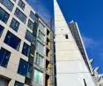 New building on the site of WROBIS at the intersection of Szewska and Kazimierza Wielkiego Streets in Wrocław