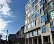 New building on the site of WROBIS at the intersection of Szewska and Kazimierza Wielkiego Streets in Wrocław