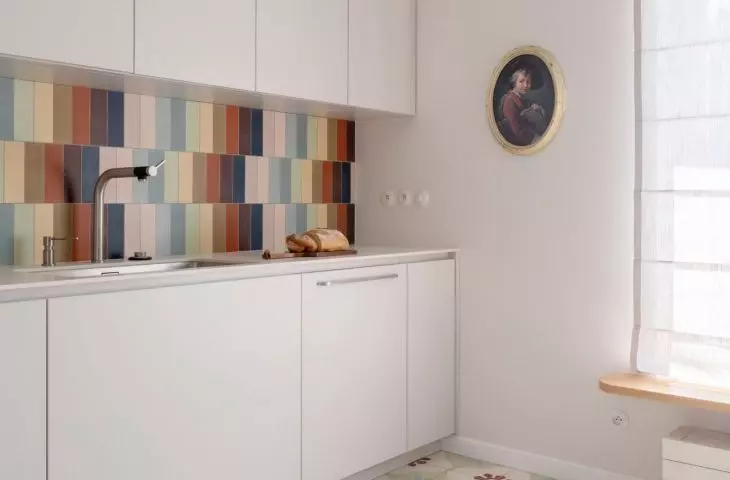 The kitchen walls and floors were decorated with cement tiles custom made for a custom design in Morocco
