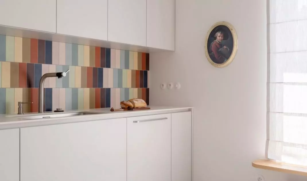The kitchen walls and floors were decorated with cement tiles custom made for a custom design in Morocco