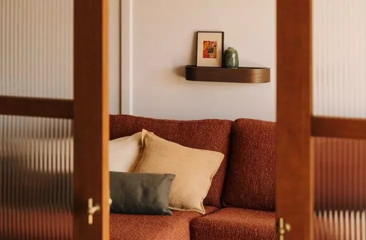 Living room with burgundy sofa
