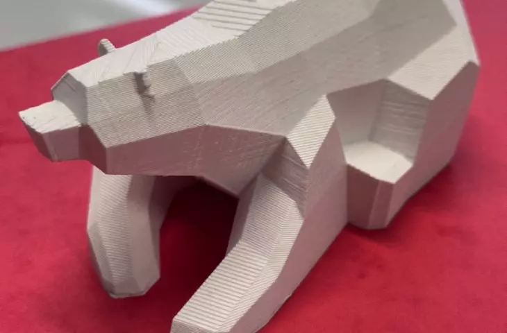 A model of a bear that will stand on the playground