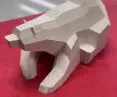 A model of a bear that will stand on the playground