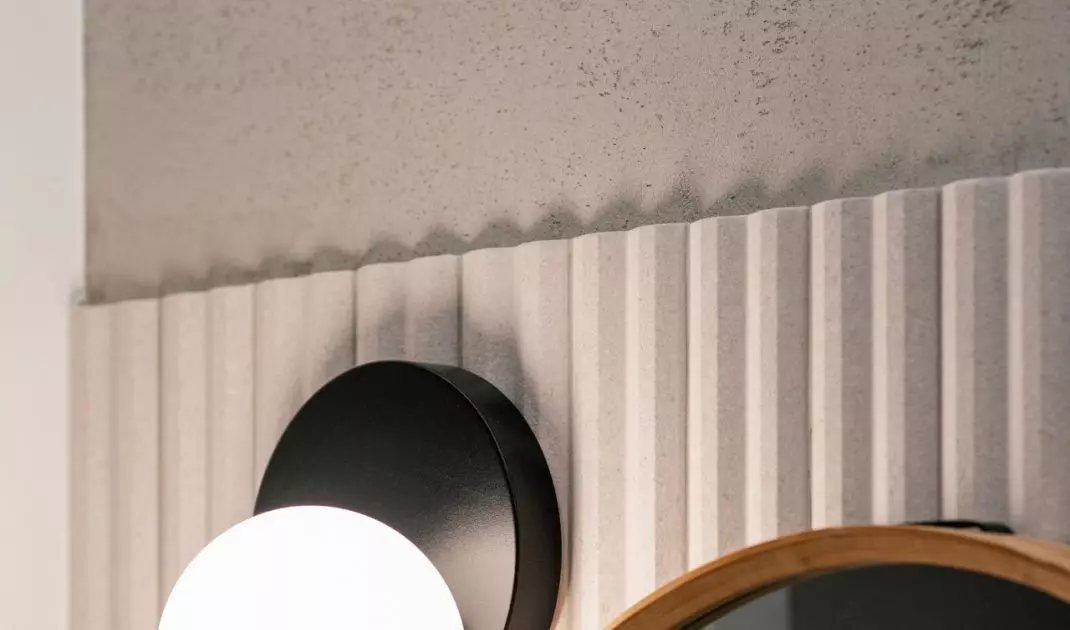 The grooves on the wall flow seamlessly into a distinctive gray, slightly rough finish