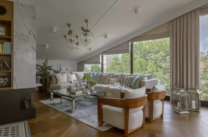 The interior is kept in a bright, soft color palette 