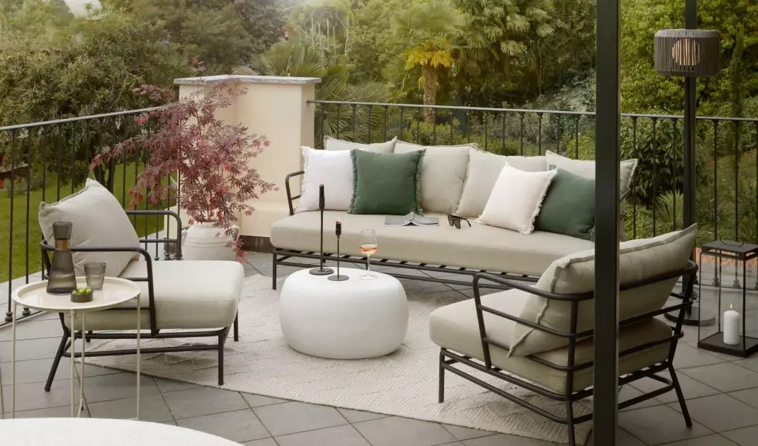 Complement the sofa in a neutral shade with subtle sage or olive-colored accents