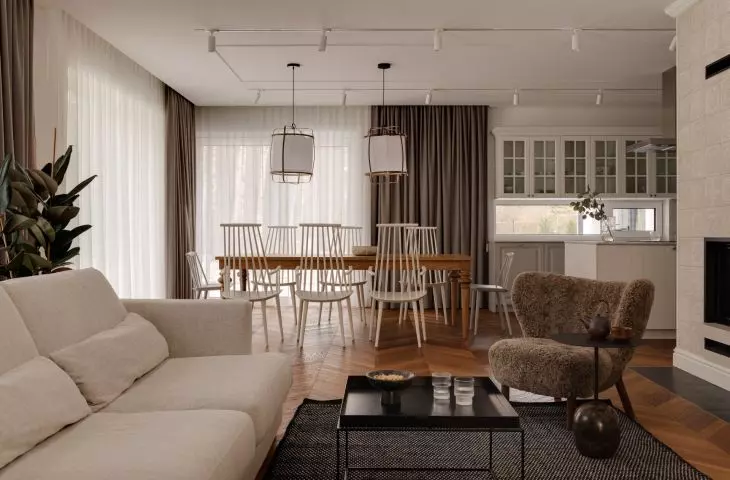 View of the living room connected to the kitchen and dining room