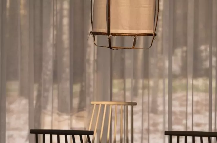 Hand-woven lamps add warmth and natural charm to the interior