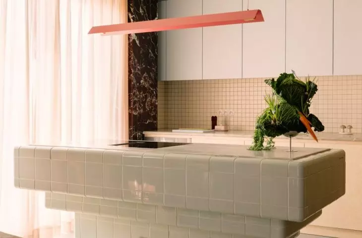 A section of the wall in the kitchen was finished with dark marble