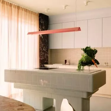 A section of the wall in the kitchen was finished with dark marble