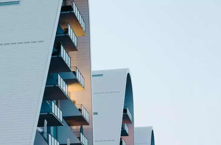 The Wave apartment complex in Vejle, Denmark - the side elevations of the towers are smooth and vertical, dominated by large-format glazing