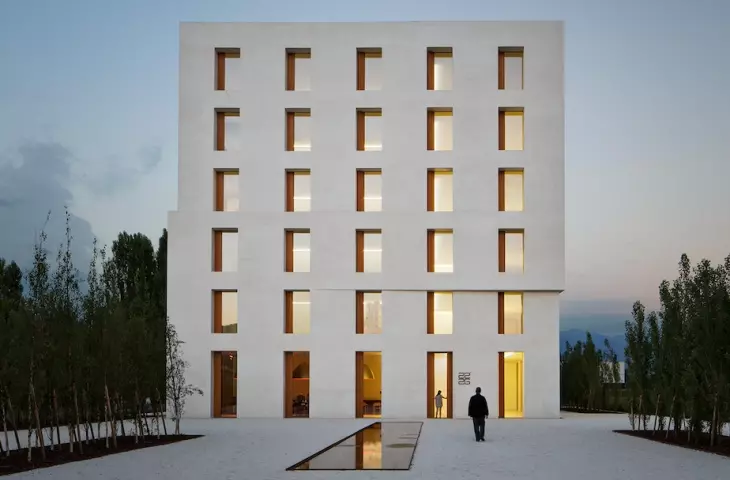 Office building 2226 in Lustenau - a block with a square plan of 24 x 24 meters and a height of 24 meters takes the shape of a cuboidal building