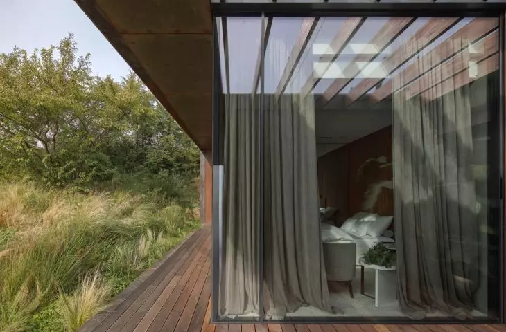 House blended into Vistula escarpment