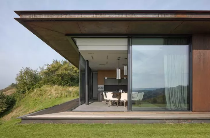 House blended into Vistula escarpment