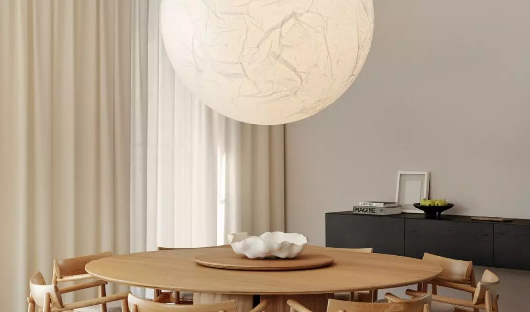 Above the dining table hangs the unique Moon lamp by Davide Groppi