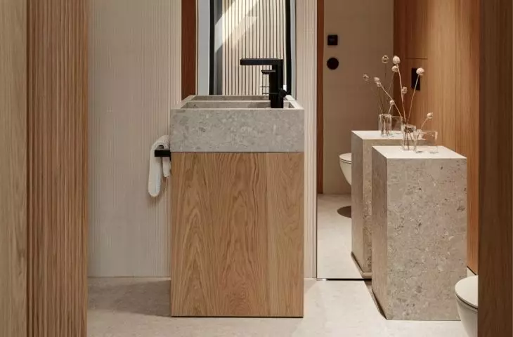 The interior combines modern architecture with the warmth of natural materials