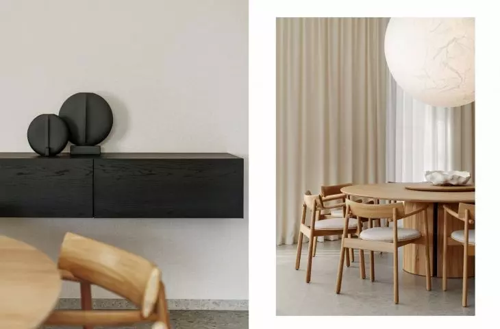 The black cabinet provides a strong counterpoint to the soft arrangement