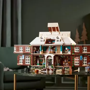 The side walls and roof fold out to show the floors and rooms, which were recreated from the film stills