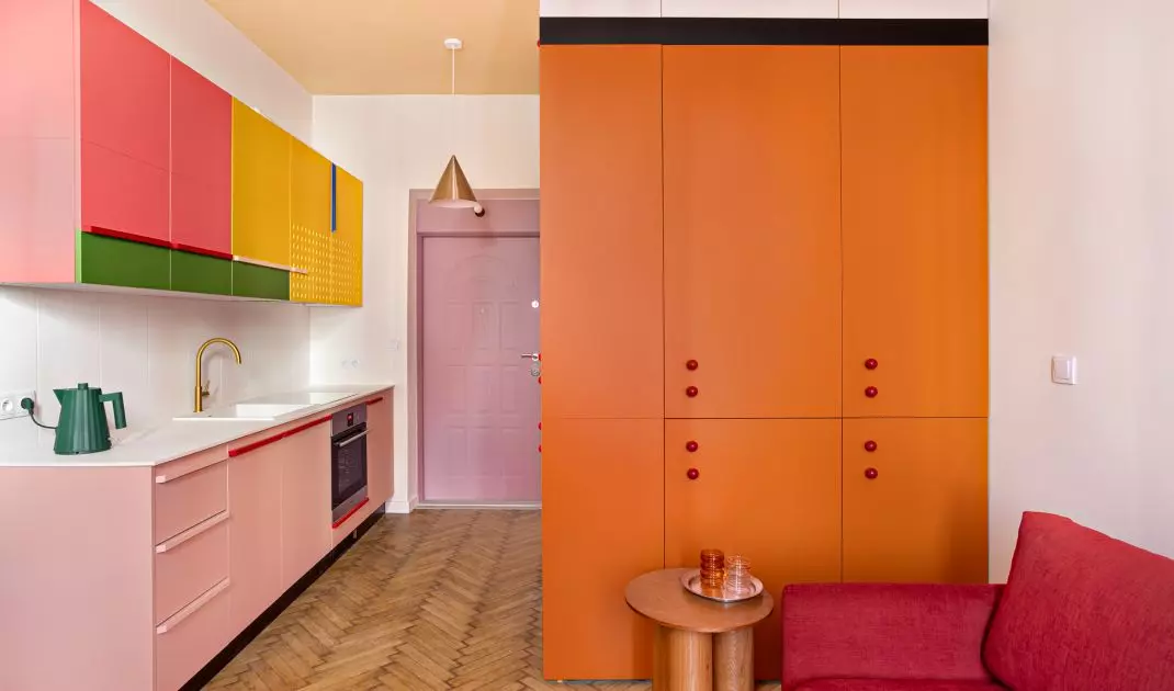 The closet hides the entrance to the bathroom